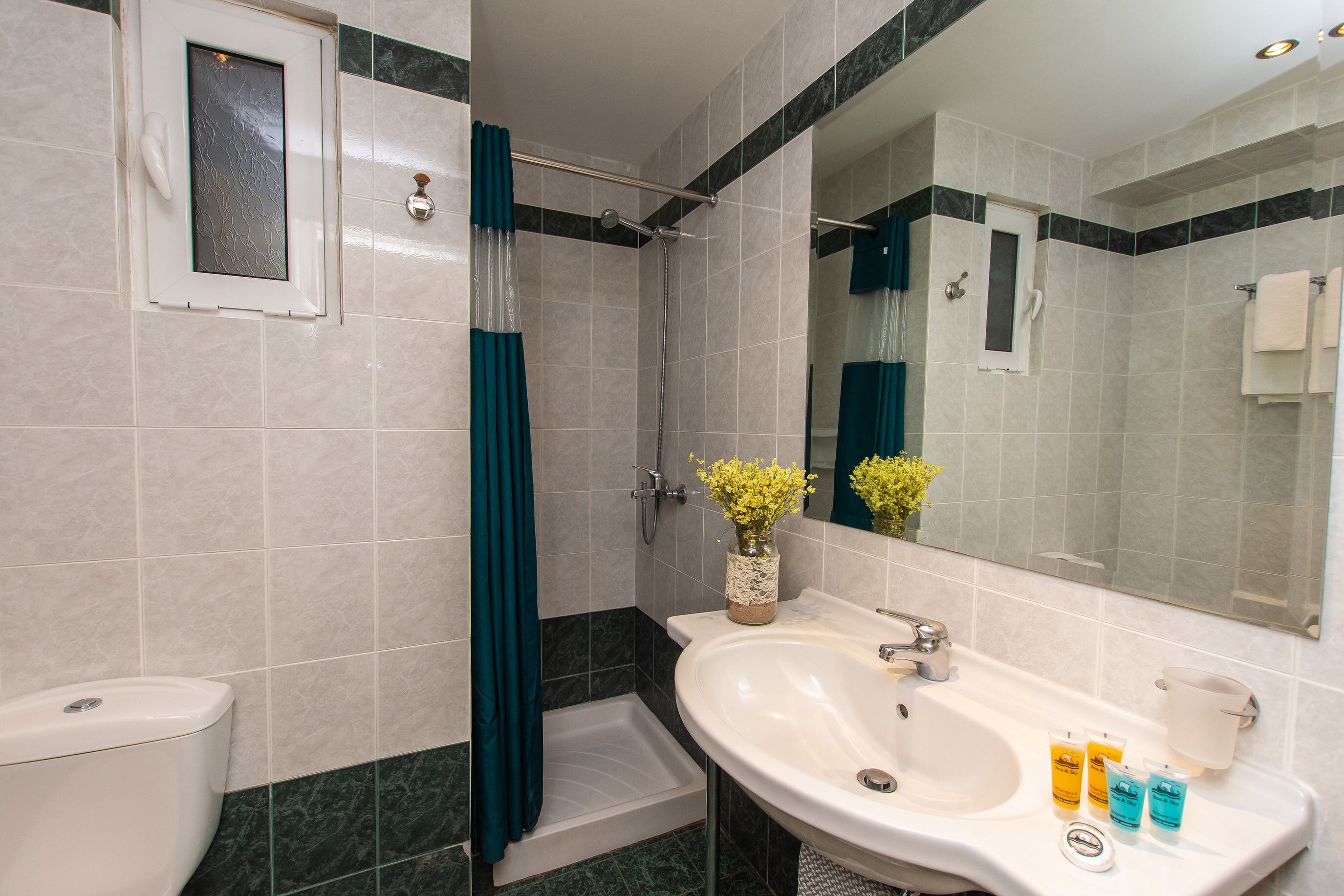 double or twin room, partial sea view | bathroom | free toiletries, hair dryer, slippers, towels