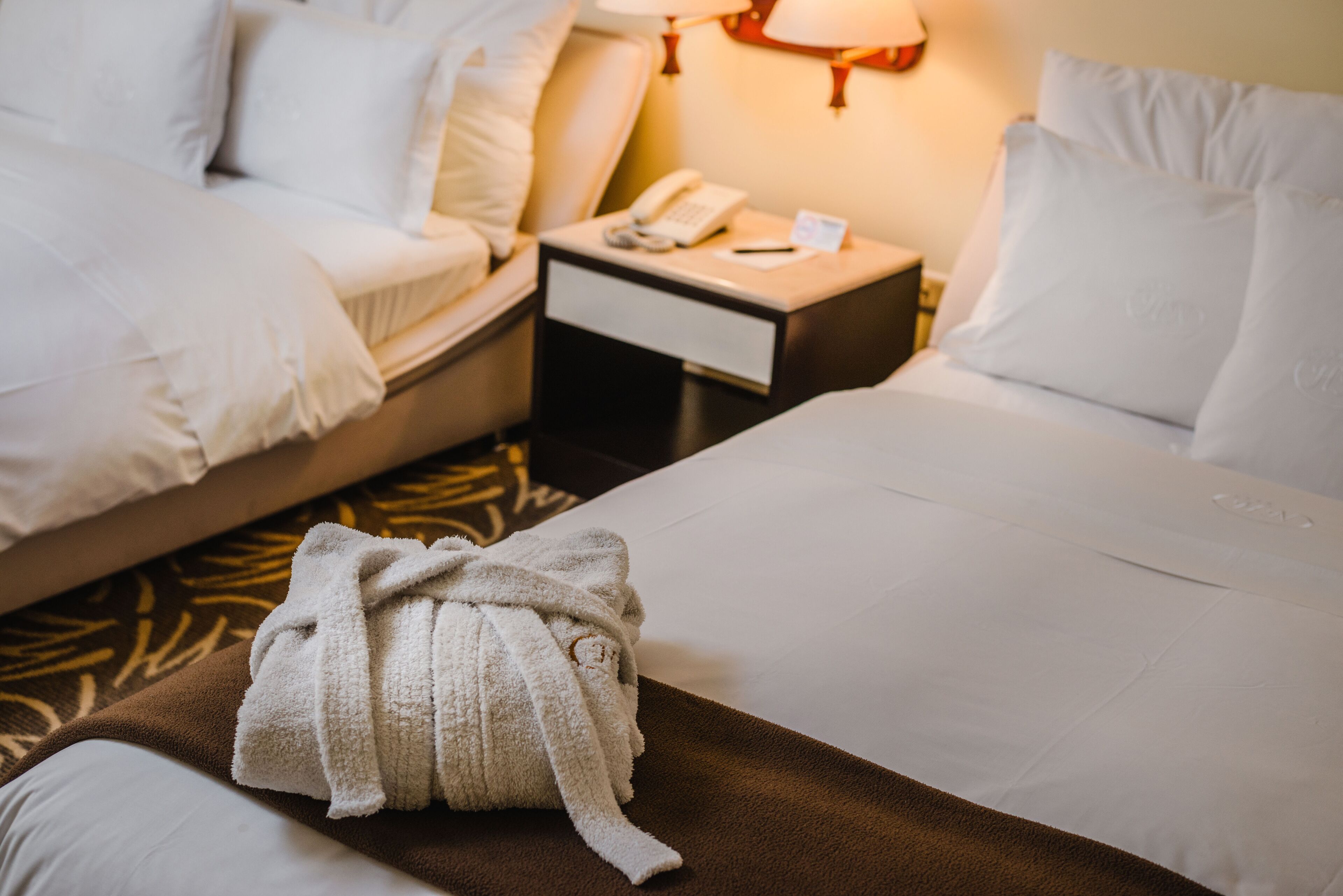 standard twin room (+extra single bed) | down duvets, in-room safe, desk, blackout curtains