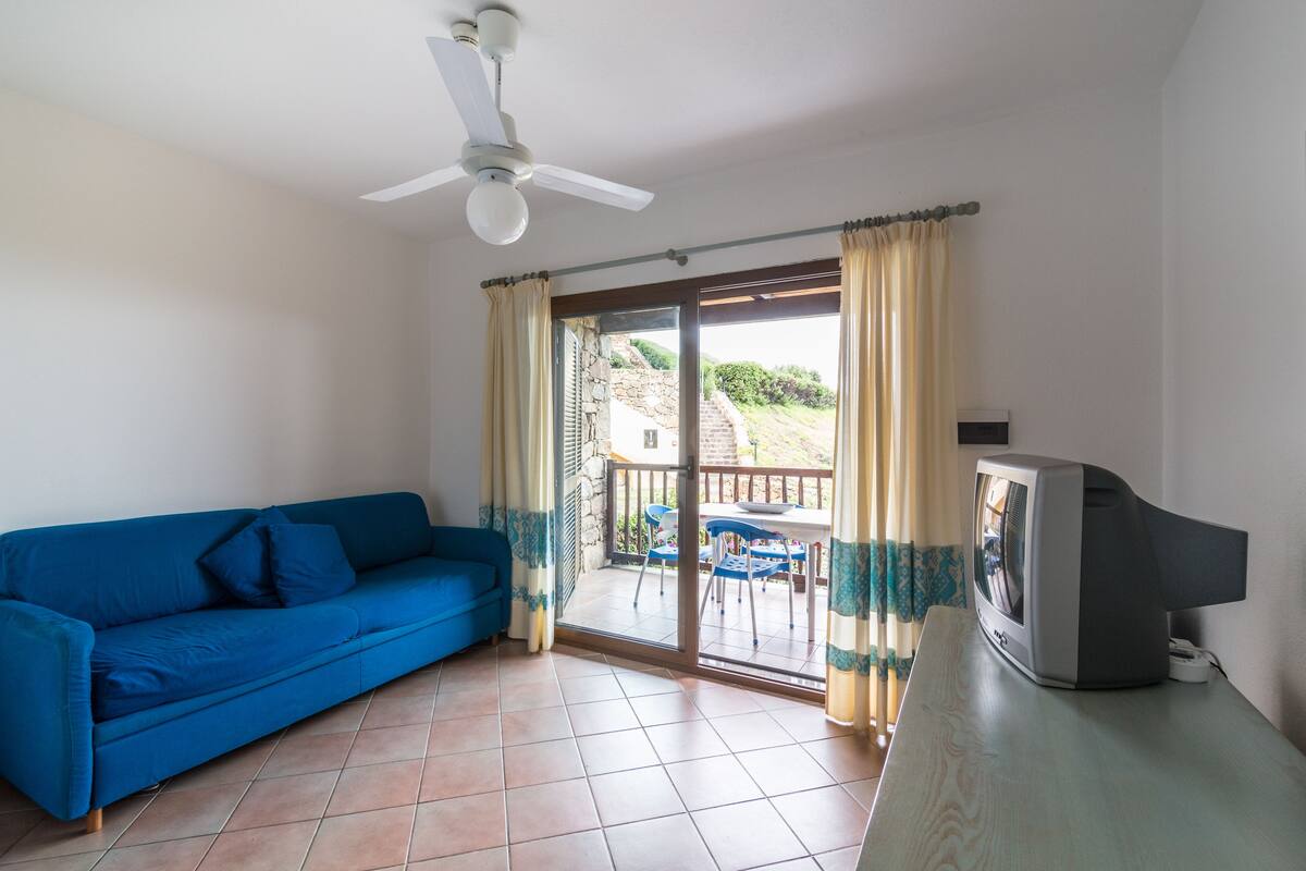 Apartment, 1 Bedroom | Living area | TV
