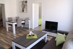 Televisión de pantalla plana, reproductor de DVD