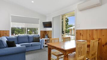 Cottage, 2 Bedrooms | Living area | Flat-screen TV, DVD player