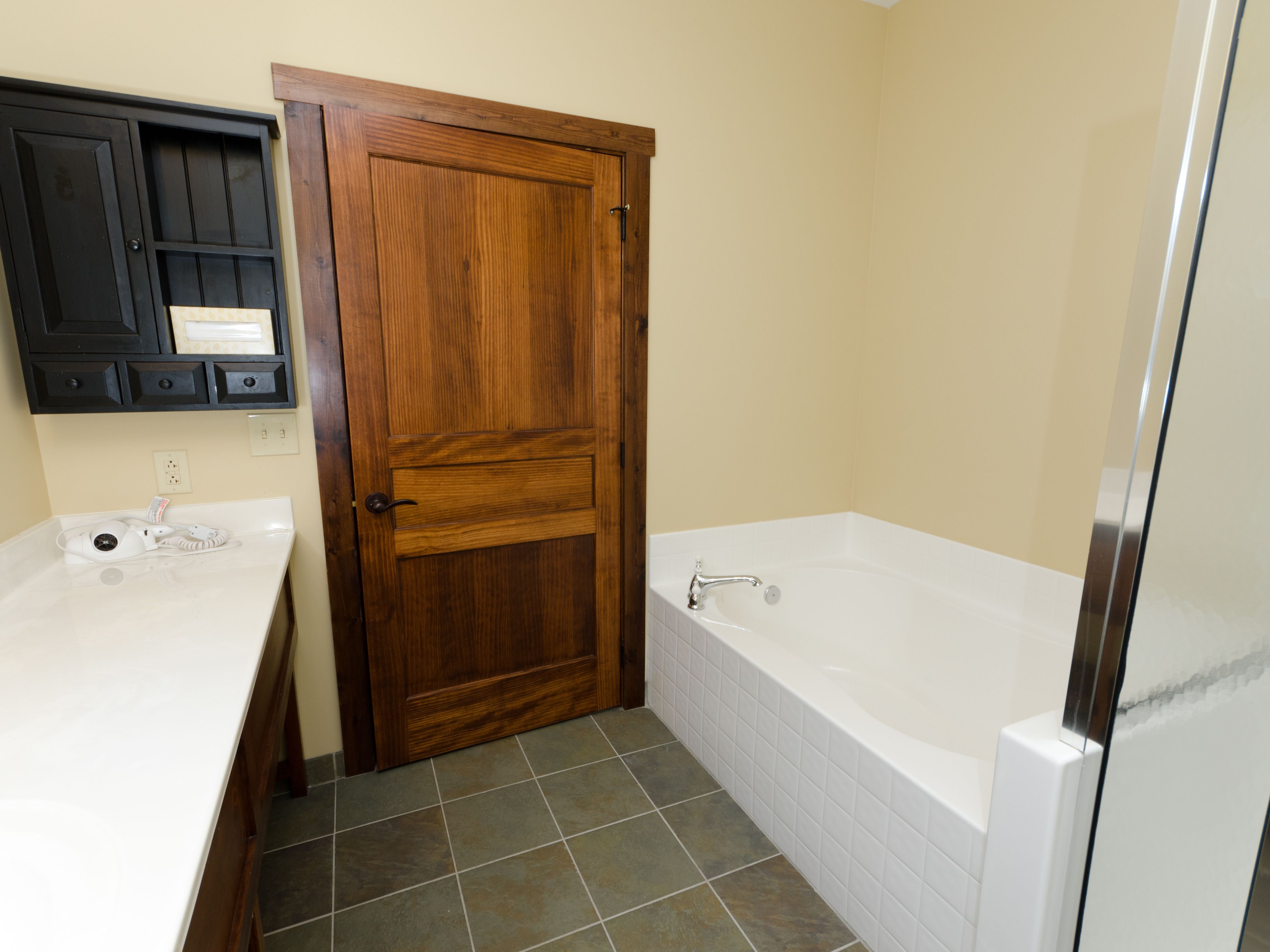 two bedroom condo deluxe | bathroom | hair dryer, shampoo