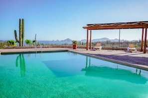 7 outdoor pools, pool umbrellas, pool loungers - Sunrock Hotel and Suites (Cabo San Lucas)