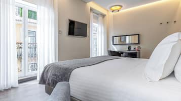 Quarto superior | Roupas de cama premium, edredons de pluma, frigobar, cofres nos quartos