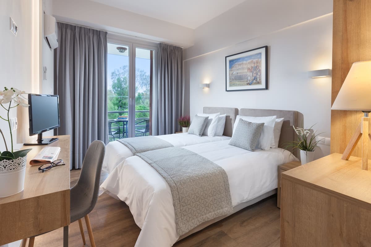 Superior Twin Room | Desk, laptop workspace, iron/ironing board, free WiFi