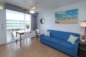 Family Suite, 1 Bedroom, Kitchenette, Partial Ocean View | Living area | TV - Paradise Oceanfront Resort (Wildwood Crest)