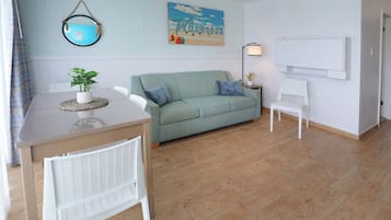 Family Suite, 2 Double Beds, Ocean View (Non-Efficiency) | Living area | TV