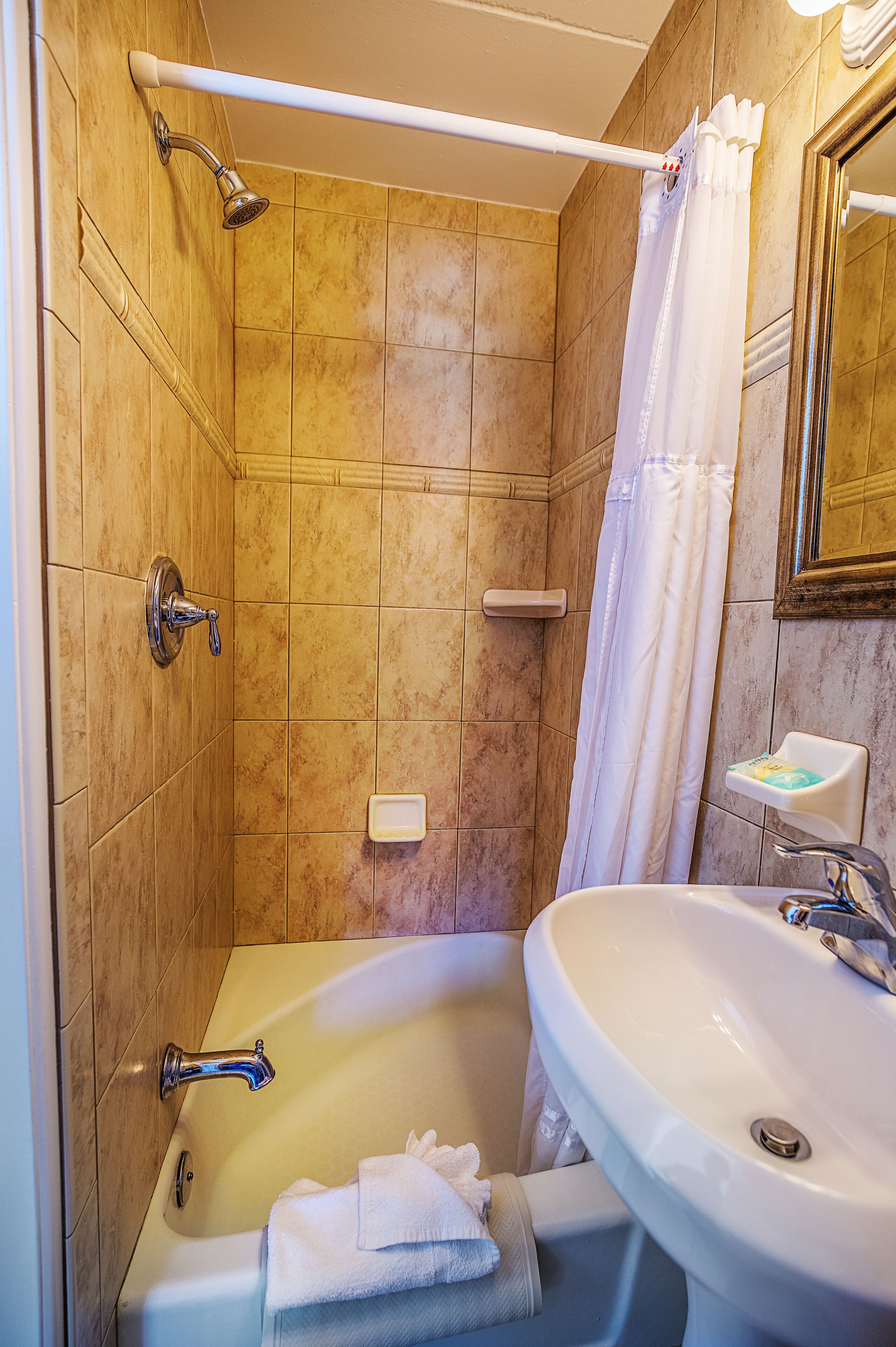 basic studio, 1 king bed with sofa bed, kitchenette | bathroom | towels