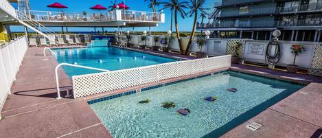 Seasonal outdoor pool, pool loungers