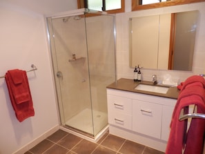 Bathroom | Shower, free toiletries, hair dryer, bathrobes