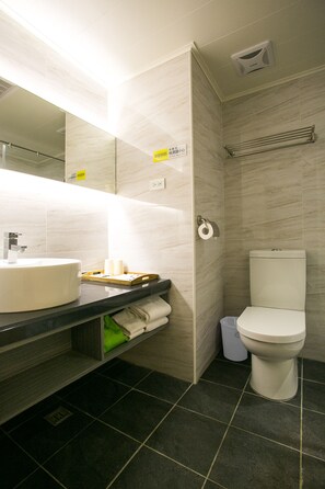 A modern bathroom with a round sink, a toilet, and a towel rack. - Huang Shin Business Hotel - Shan Ah Branch (Taichung)