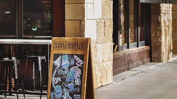 Welcome to Stoneburner, where a chalkboard menu greets guests outside.