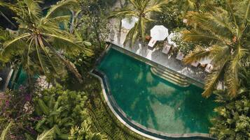 2 outdoor pools, pool umbrellas, pool loungers