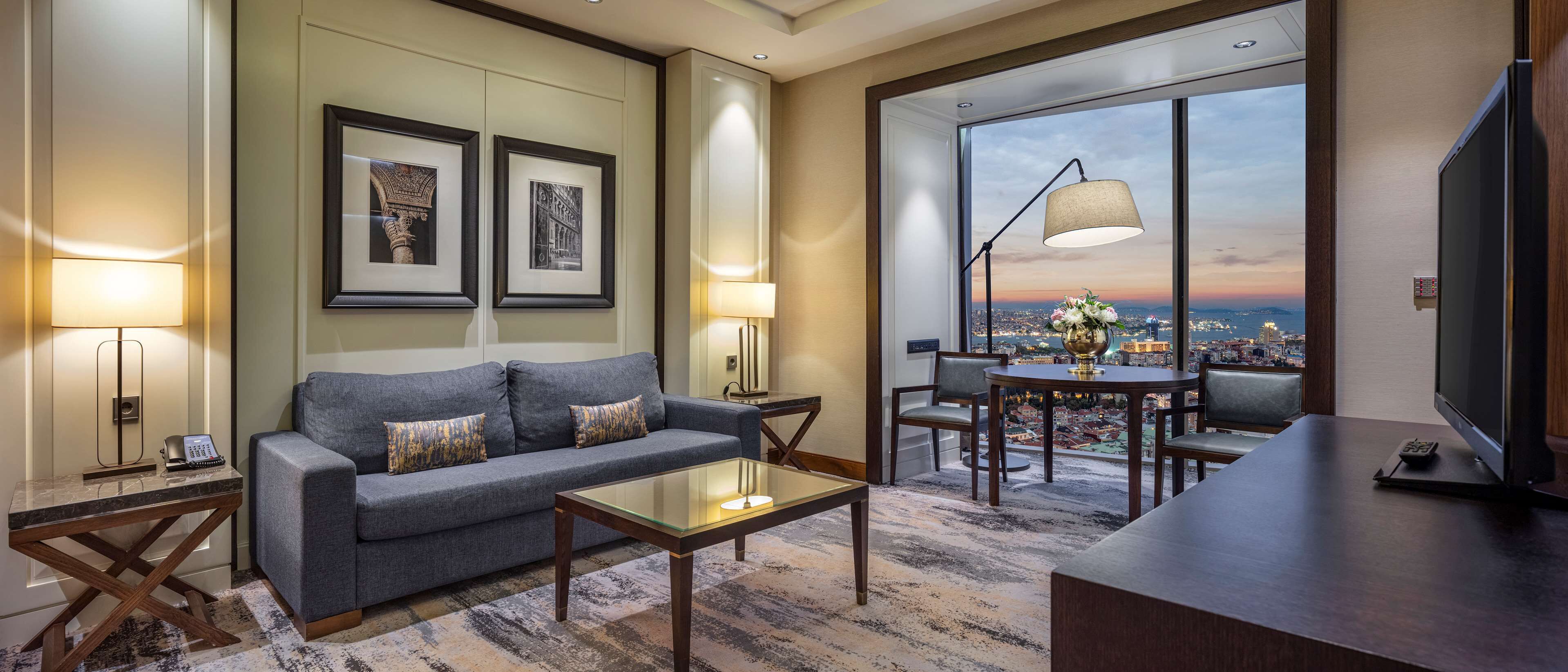 suite, 1 king bed, sea view (taksim suite) | living area | 42-inch flat-screen tv with cable channels, tv, mp3 dock