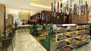A modern interior with a bar area, seating, and a display of candles.