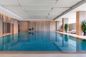 Indoor pool, outdoor pool, open 7:00 AM to 10:00 PM, pool umbrellas