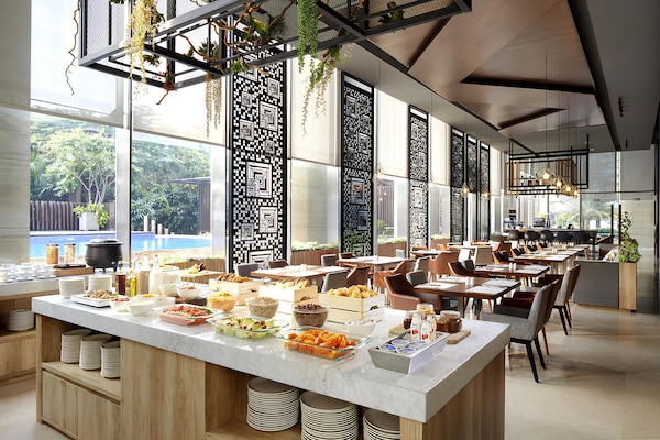 Breakfast, lunch, dinner served; international cuisine, pool views