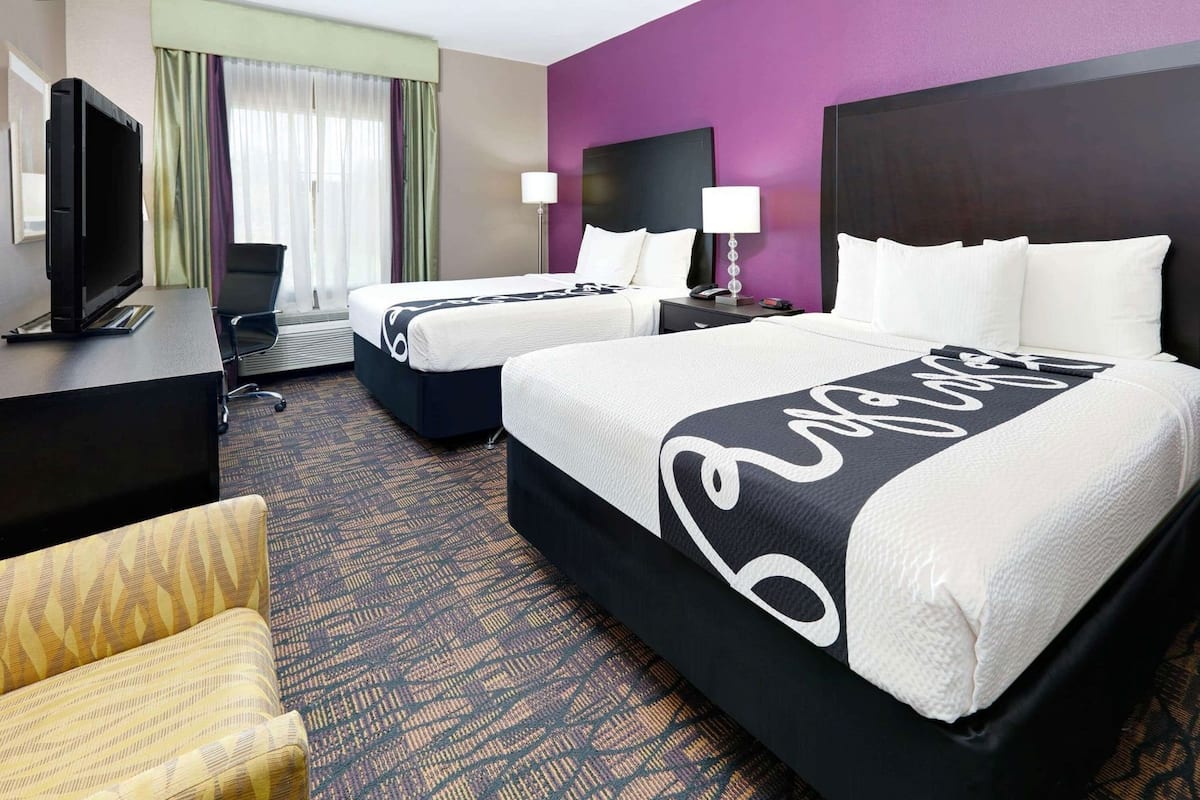 Premium bedding, desk, blackout drapes, iron/ironing board