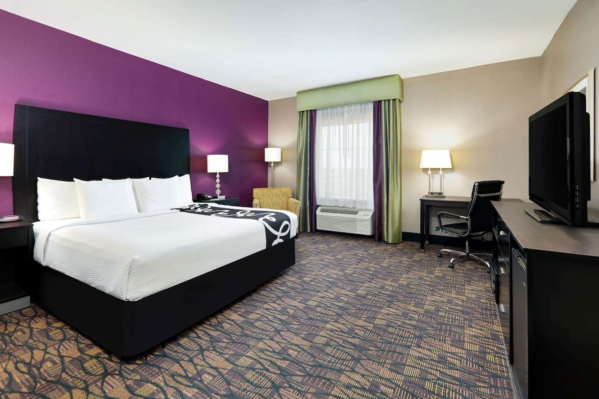 Premium bedding, desk, blackout drapes, iron/ironing board