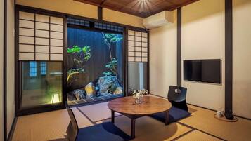 Traditional House, 2 Bedrooms, Kitchen, Garden View | Living area | Flat-screen TV