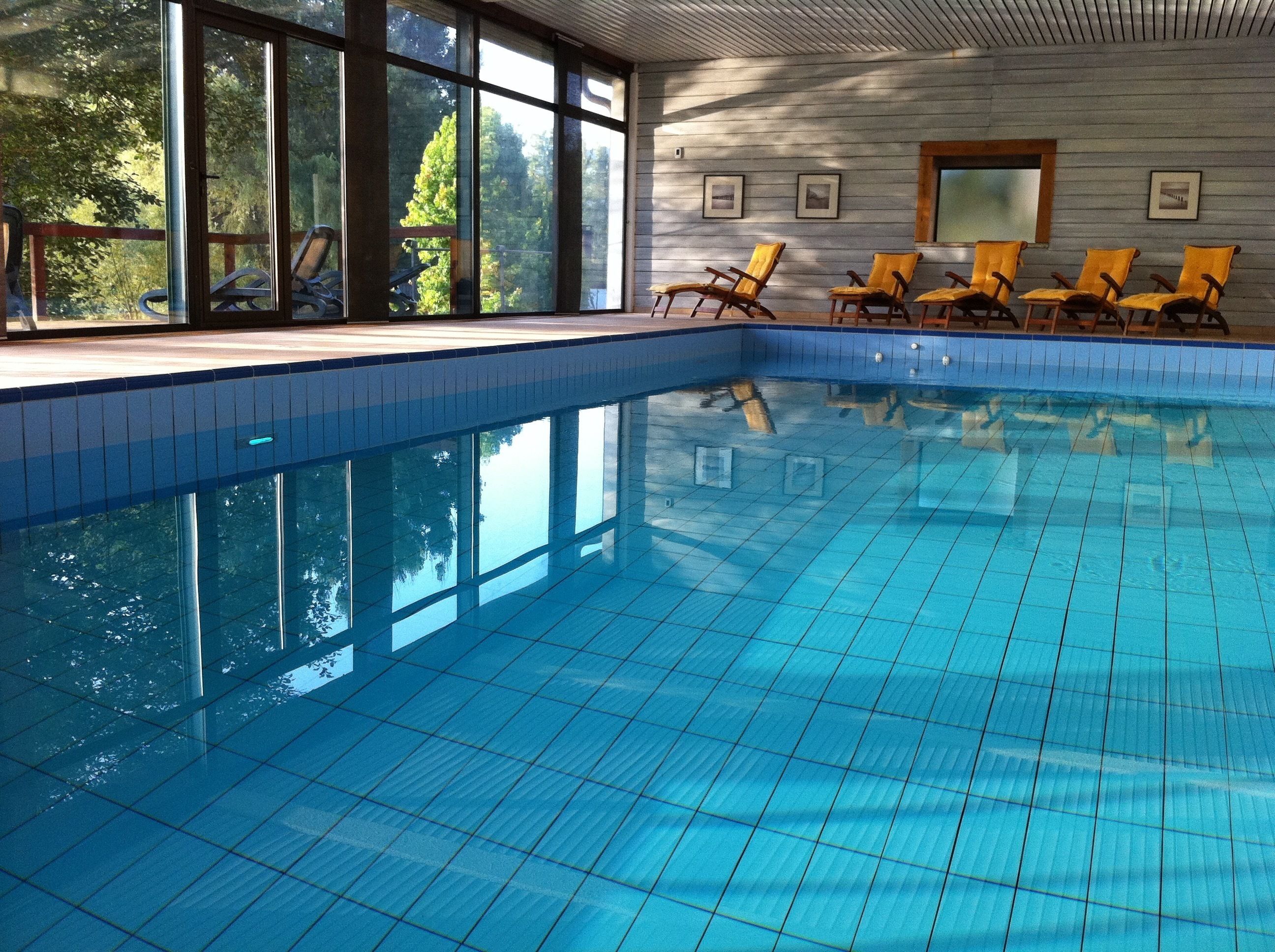 indoor pool, open 7 am to 9 pm, pool loungers