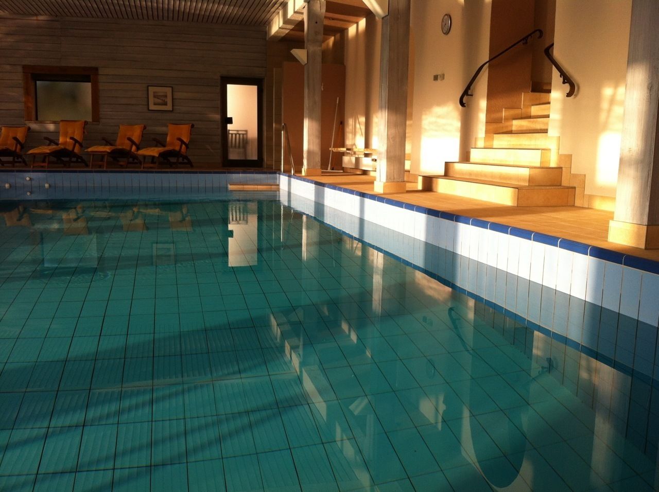 Indoor pool, open 7 AM to 9 PM, pool loungers