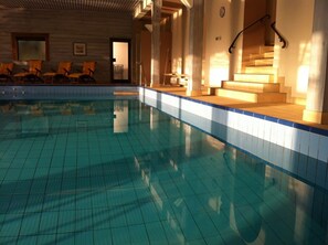 Indoor pool, open 7 AM to 9 PM, sun loungers