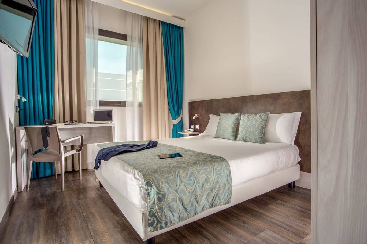 Down duvets, minibar, in-room safe, desk