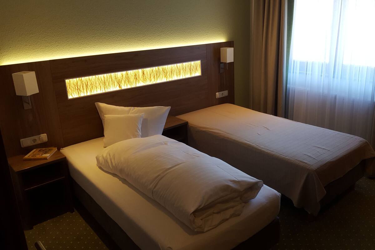 Single Room | Desk, iron/ironing board (on request), rollaway beds, free WiFi