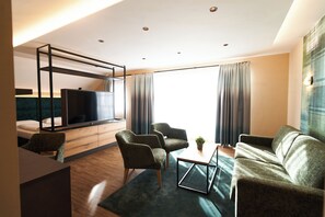 Junior Suite, 1 Bedroom, Non Smoking, Air conditioning | In-room safe, desk, blackout drapes, soundproofing