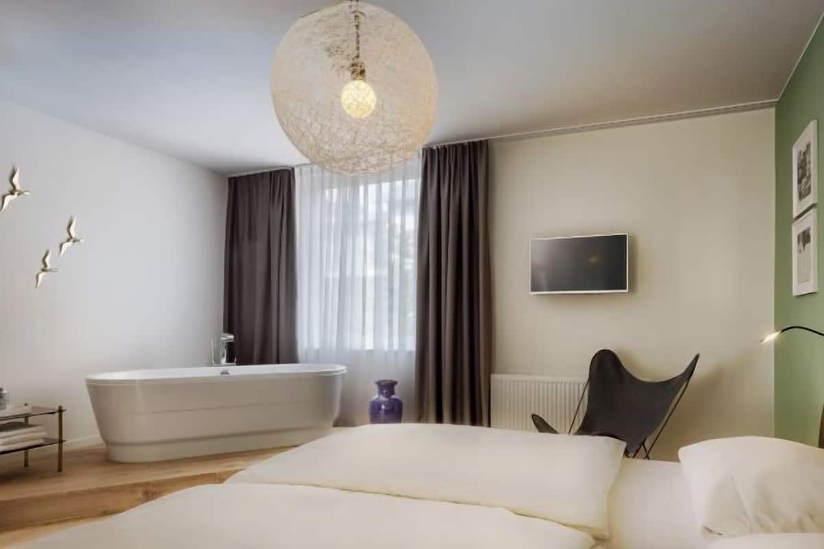 Egyptian cotton sheets, pillow-top beds, minibar, desk