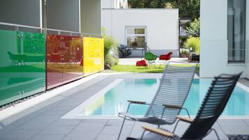 Outdoor pool, pool umbrellas, pool loungers