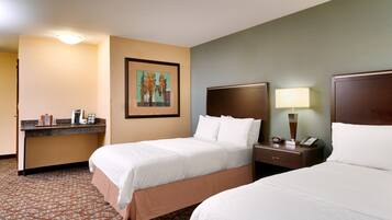 Desk, blackout drapes, iron/ironing board, free cribs/infant beds