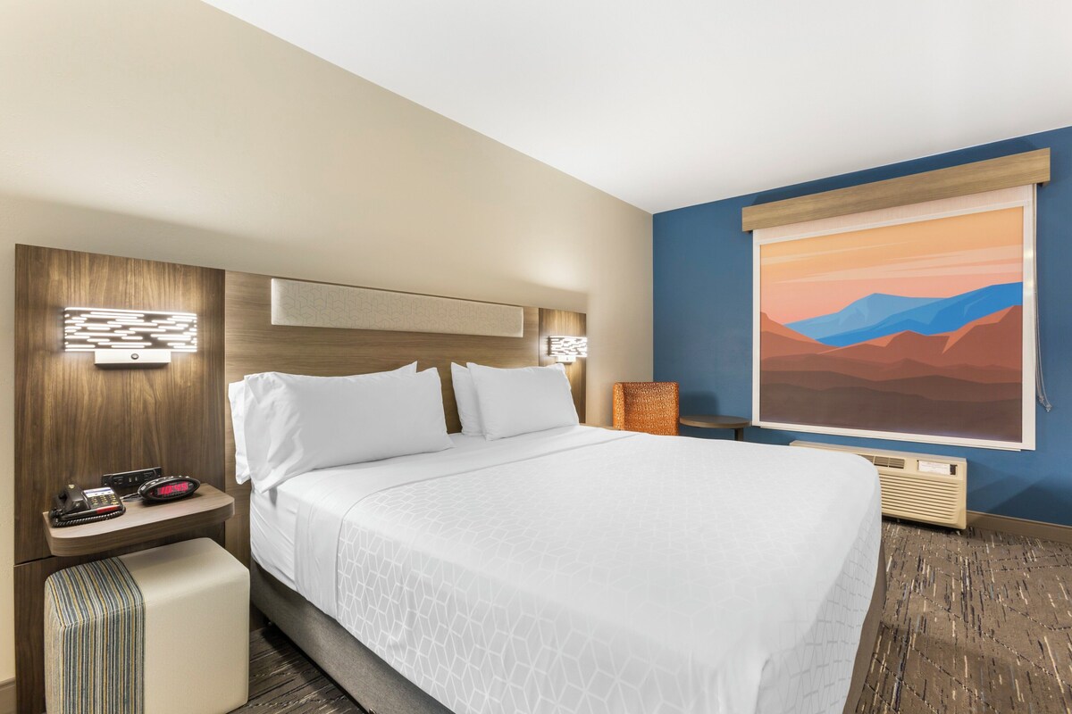 Luxe beddengoed, pillowtop-bedden, een kluis op de kamer, een bureau