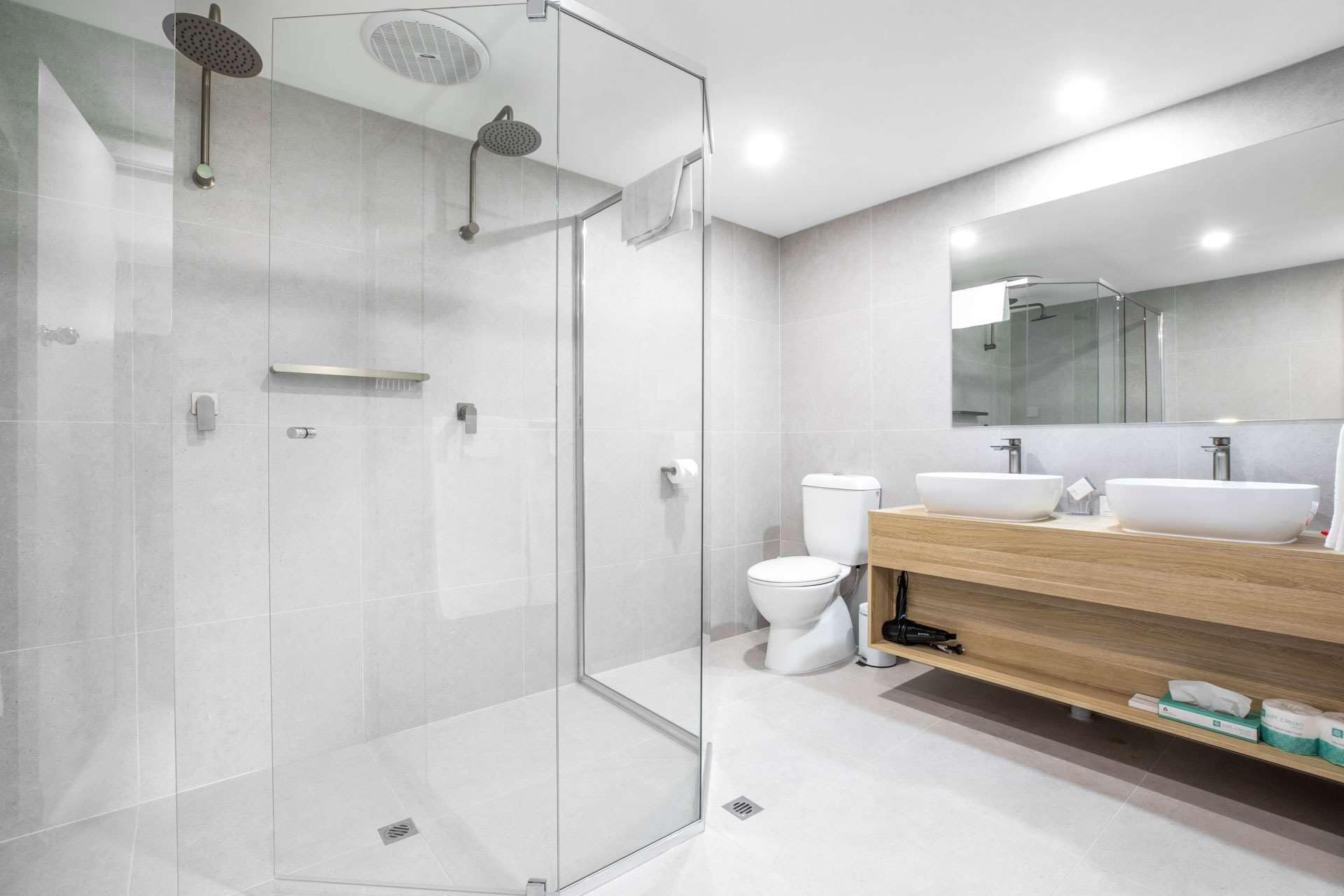 superior ocean view suite | bathroom | shower, free toiletries, hair dryer, towels