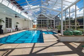 Indoor pool, open 8:00 AM to 8:00 PM, pool loungers