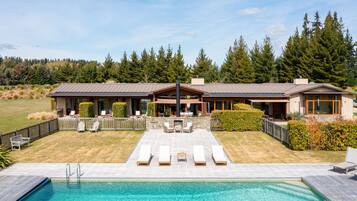 Seasonal outdoor pool, pool umbrellas, pool loungers