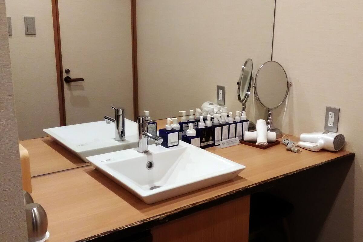 free toiletries, hair dryer, bidet, towels