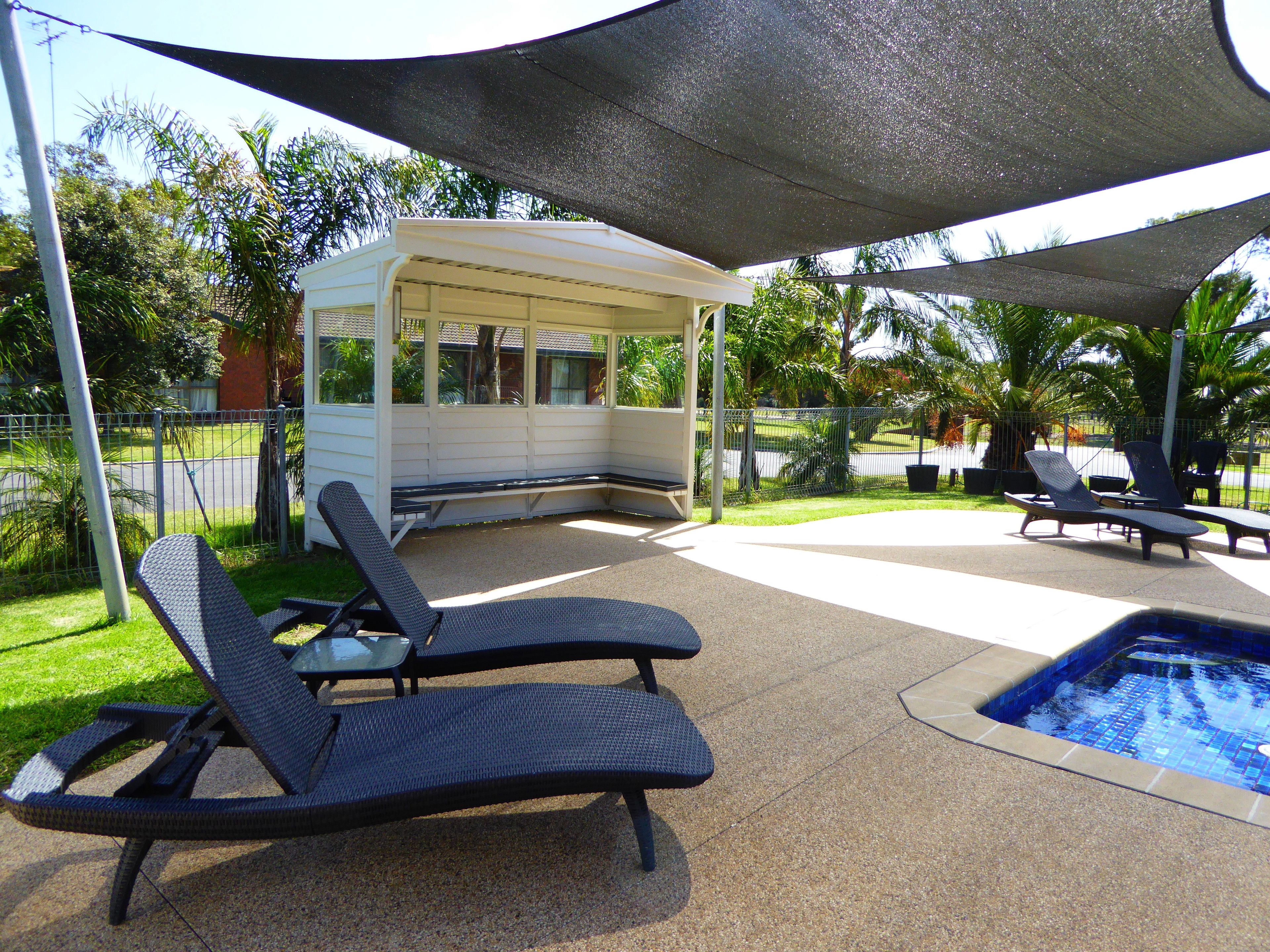 Outdoor pool, pool umbrellas, sun loungers