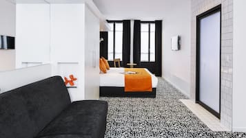 Junior Suite, 1 King Bed (Larger Room) | In-room safe, soundproofing, iron/ironing board, free WiFi