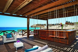 5 bars/lounges, swim-up bar, poolside bar, beach bar