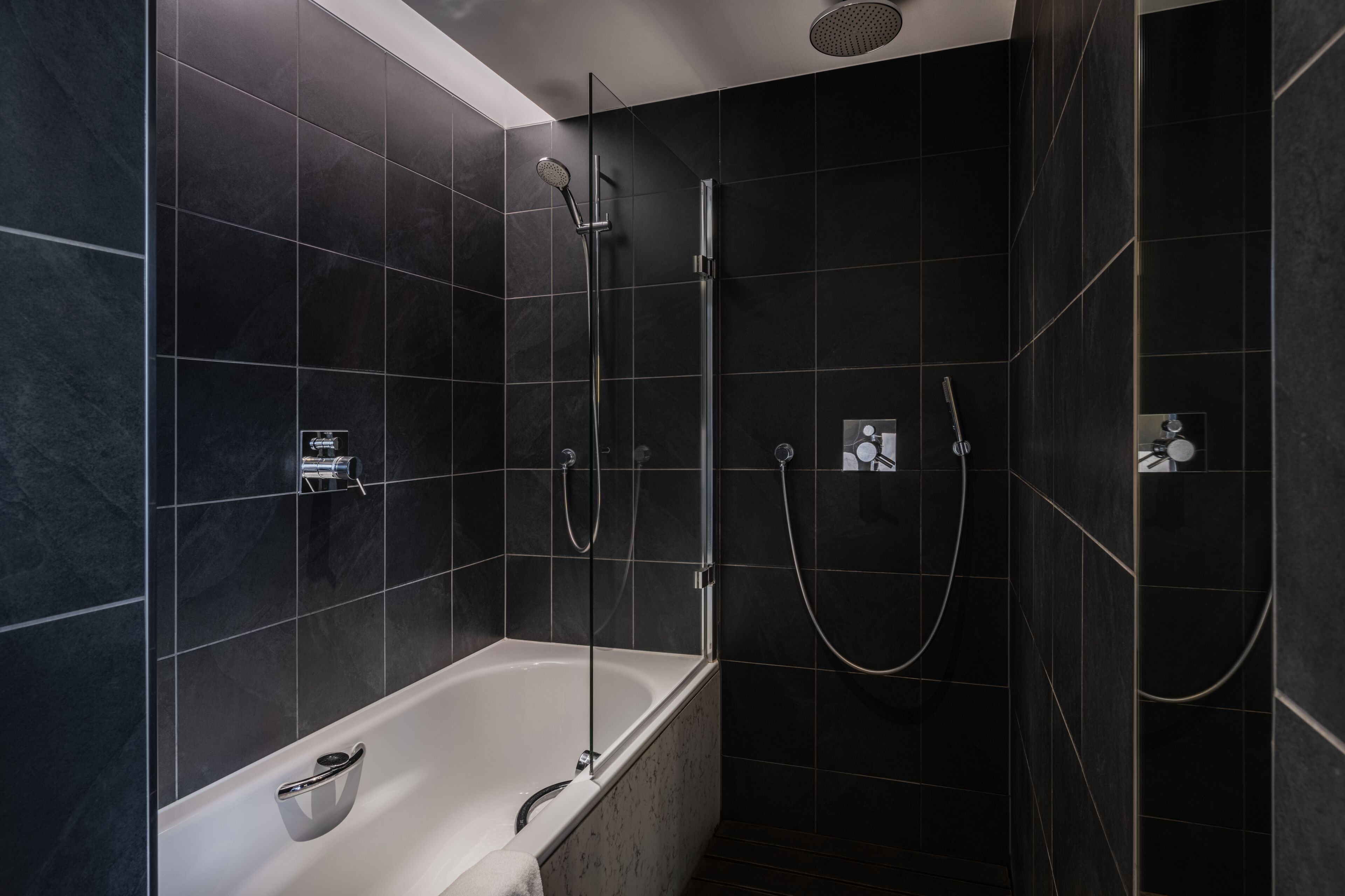 suite | bathroom | shower, designer toiletries, hair dryer, towels