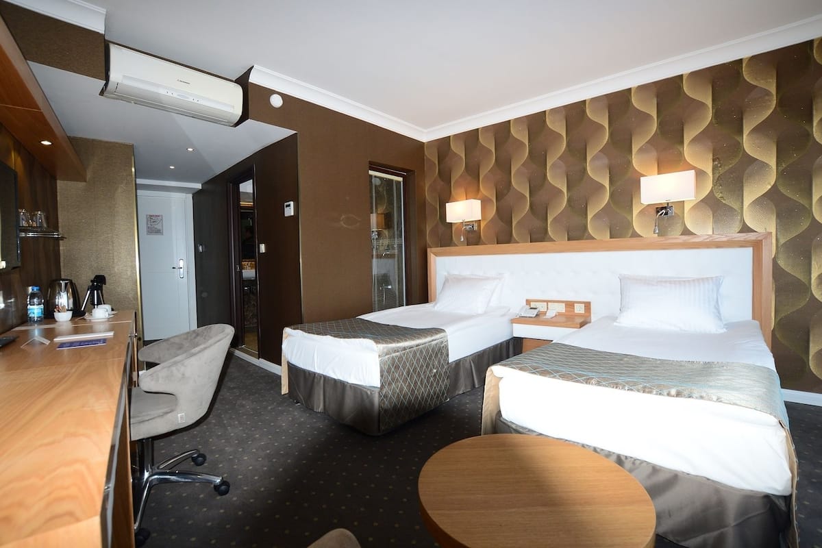 deluxe double room city view | 1 bedroom, minibar, in-room safe, desk