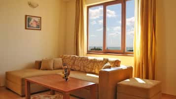 Suite, 2 Bedrooms | Living room | LCD TV