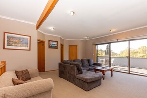 Standard Apartment | Living area | 32-cm flat-screen TV with digital channels, TV