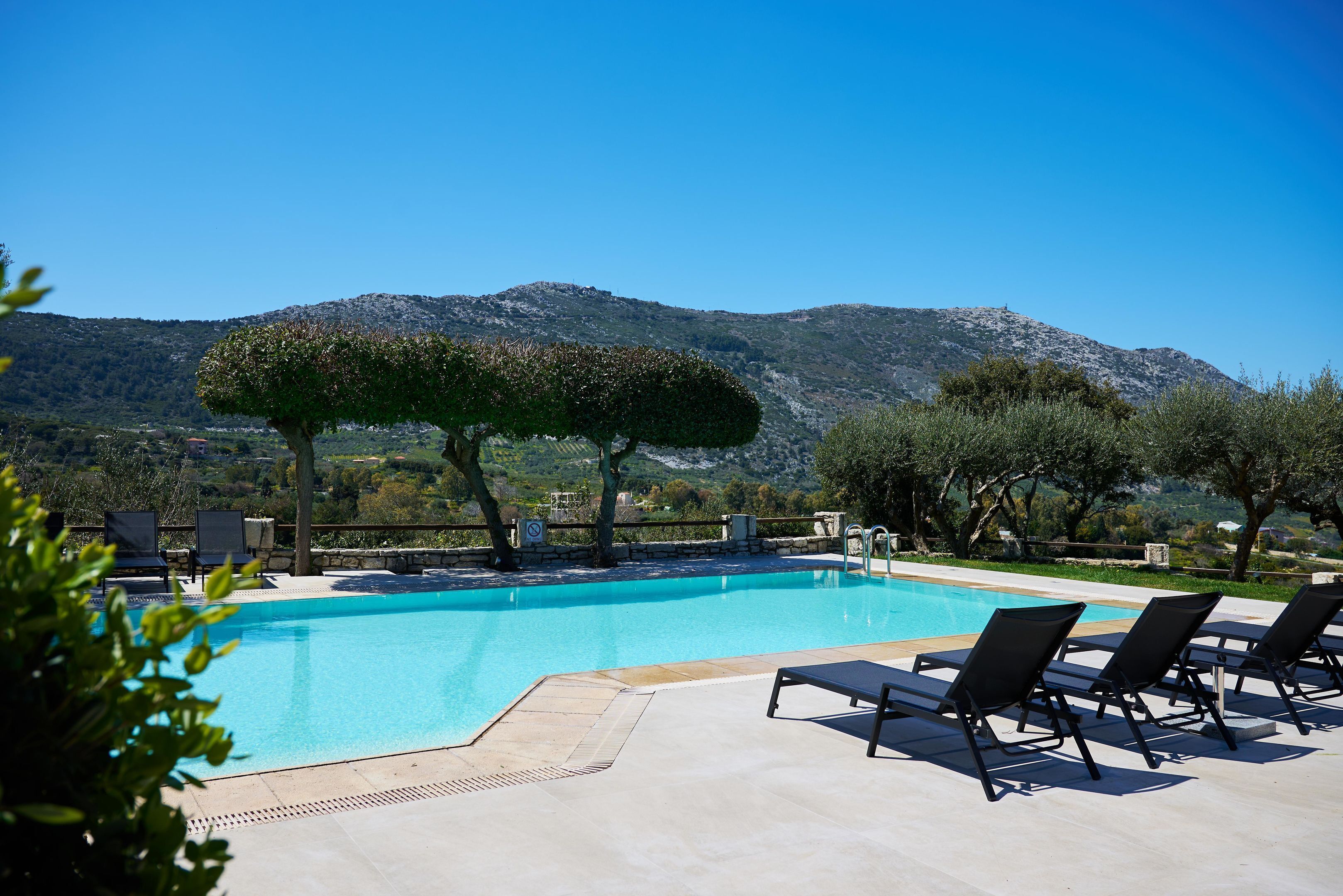 Outdoor pool, open 9:00 AM to 8:00 PM, pool umbrellas, sun loungers