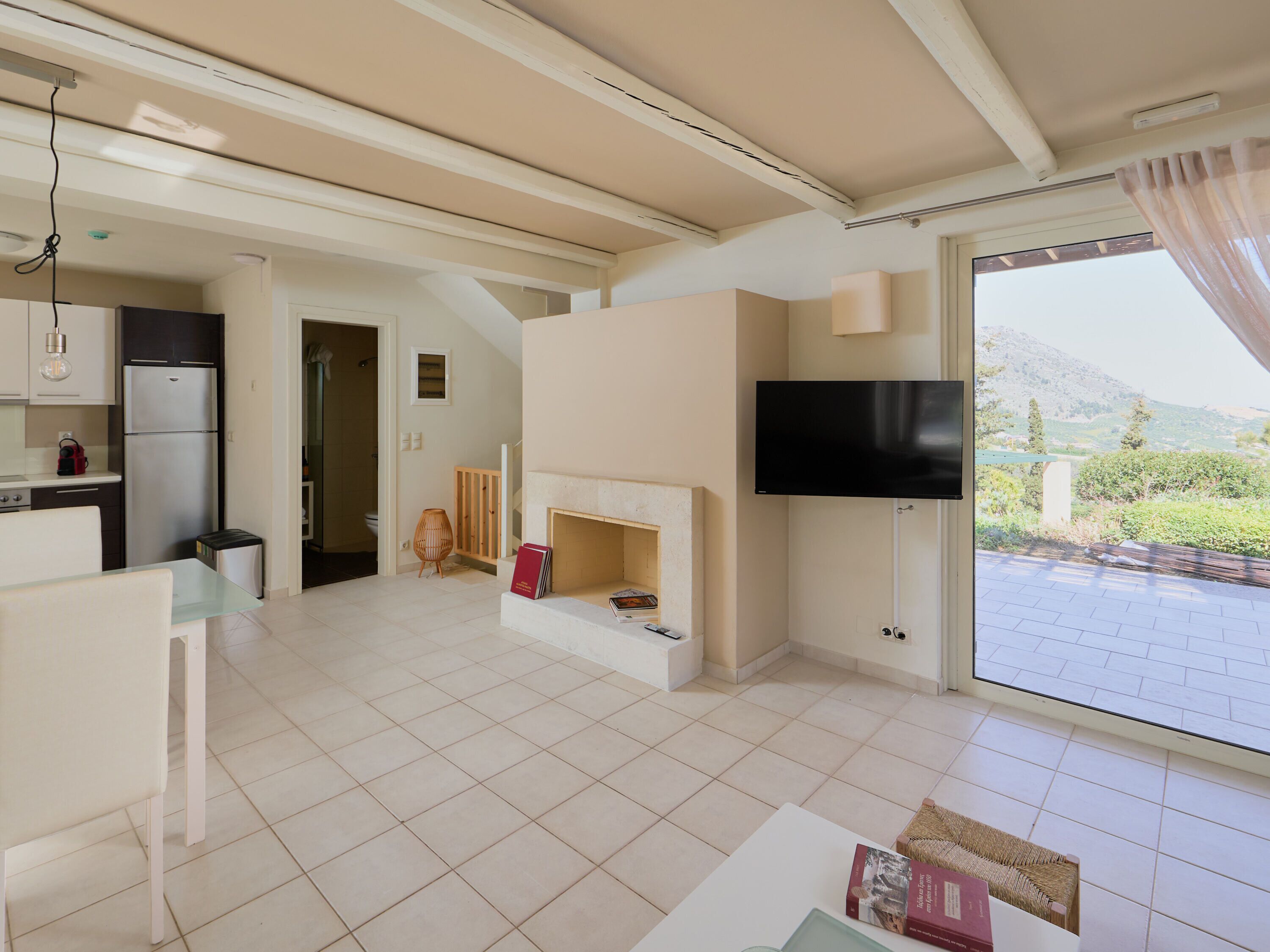 superior maisonette | living area | 42-inch flat-screen tv with satellite channels, tv, fireplace