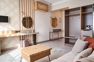 Suite, Sea View | Living area | LCD TV