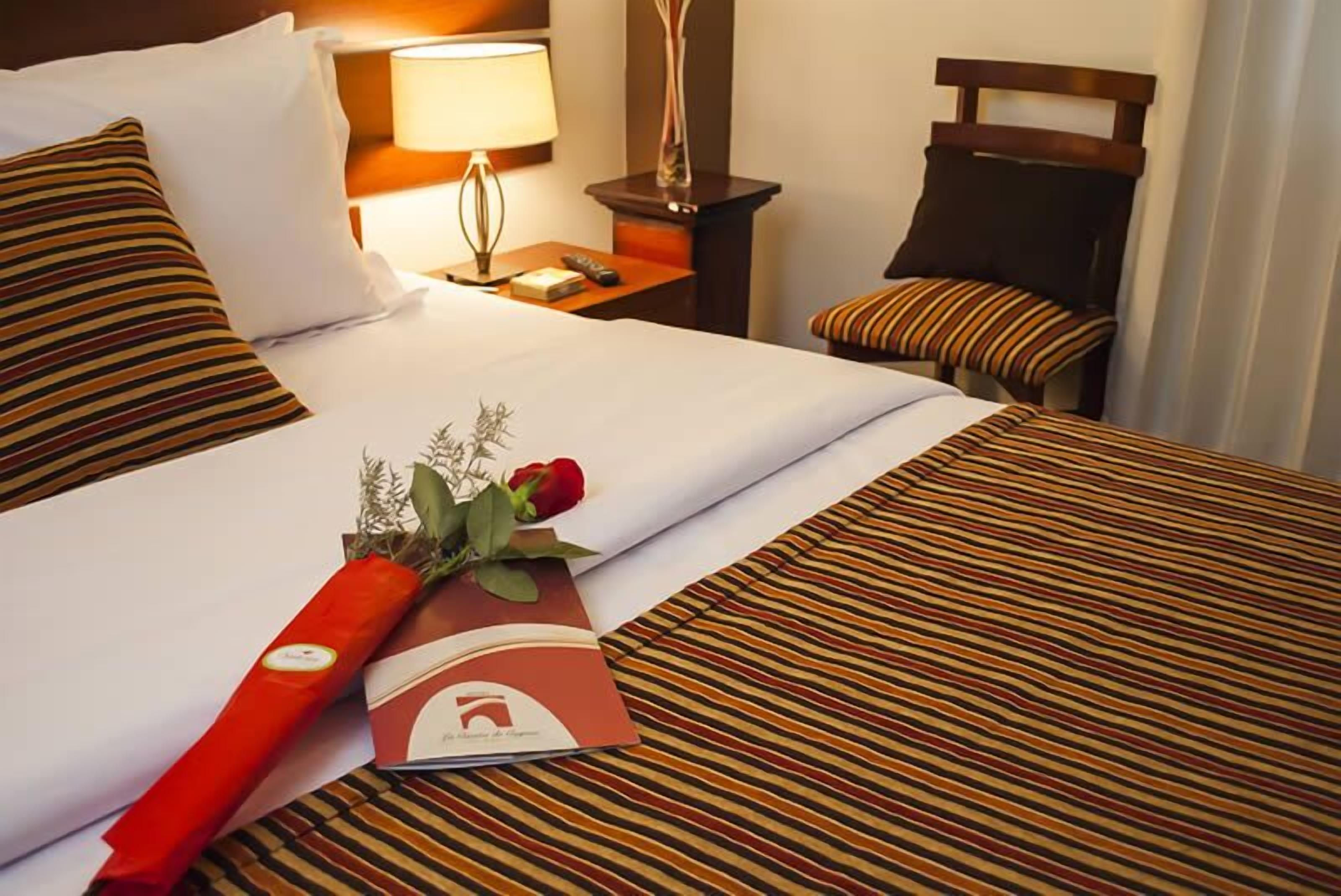 double or twin room | down duvets, minibar, in-room safe, desk