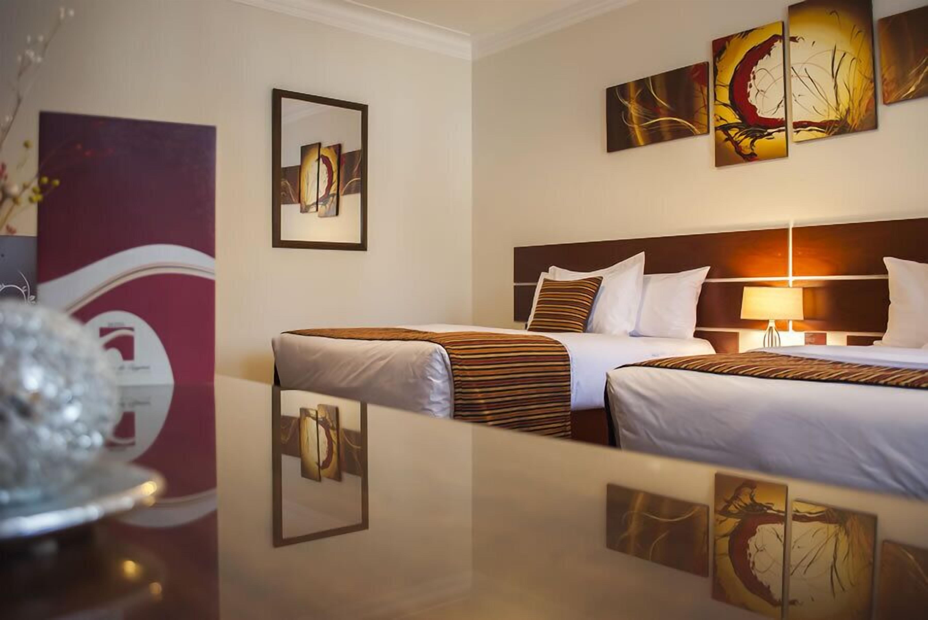 double or twin room | down duvets, minibar, in-room safe, desk